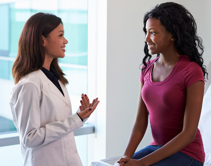 Doctor explaining hysteroscopy to a patient